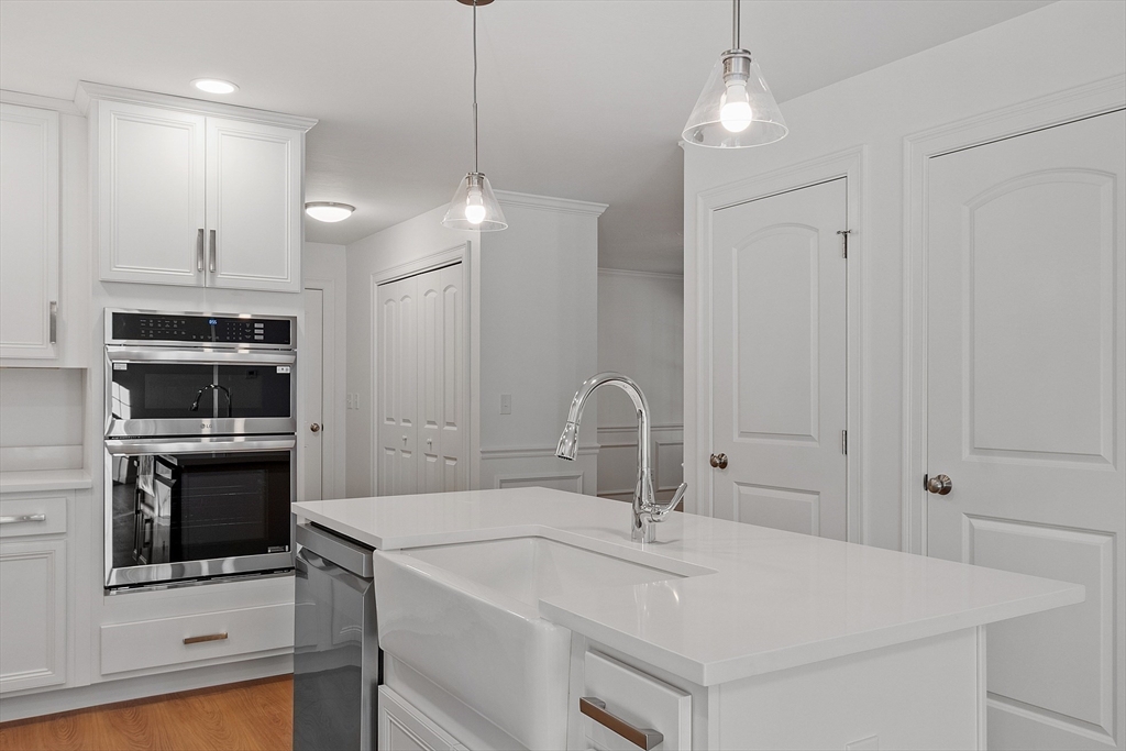 0 Gardner Road, Unit APPLEWOOD Templeton, MA 01468 - Photo 25 of 36 a kitchen with a sink a stove and a refrigerator