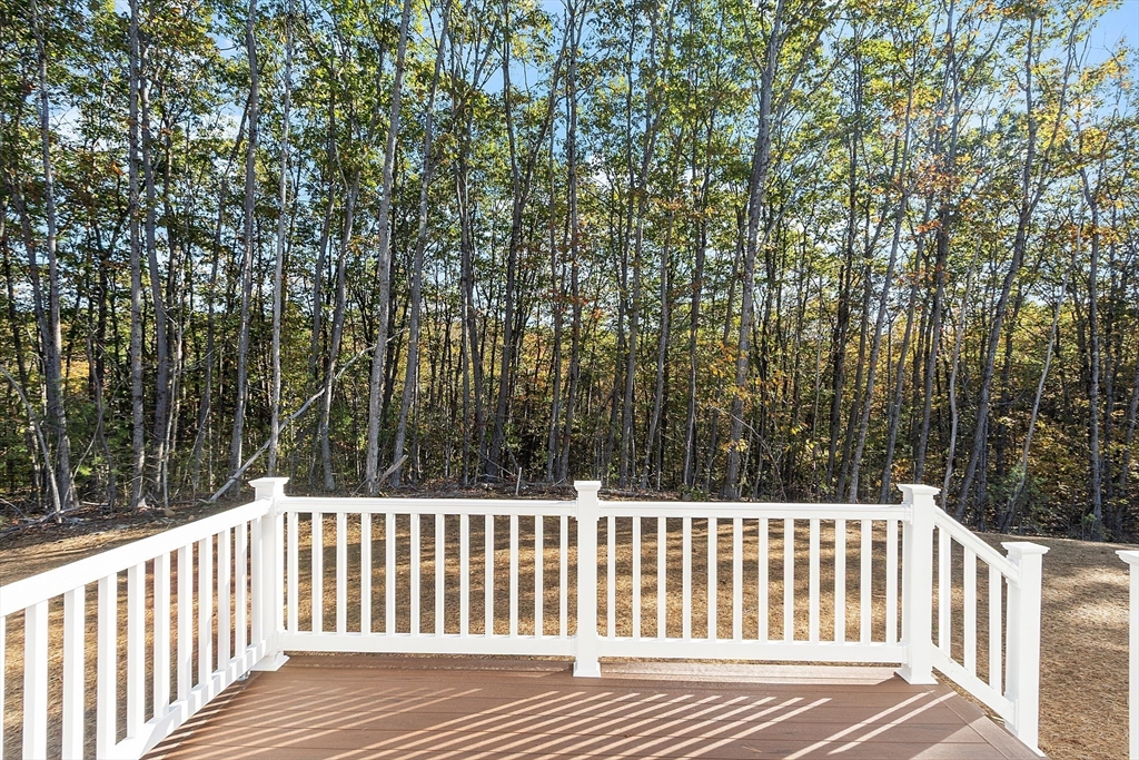 0 Gardner Road, Unit APPLEWOOD Templeton, MA 01468 - Photo 35 of 36 a view of a wooden fence