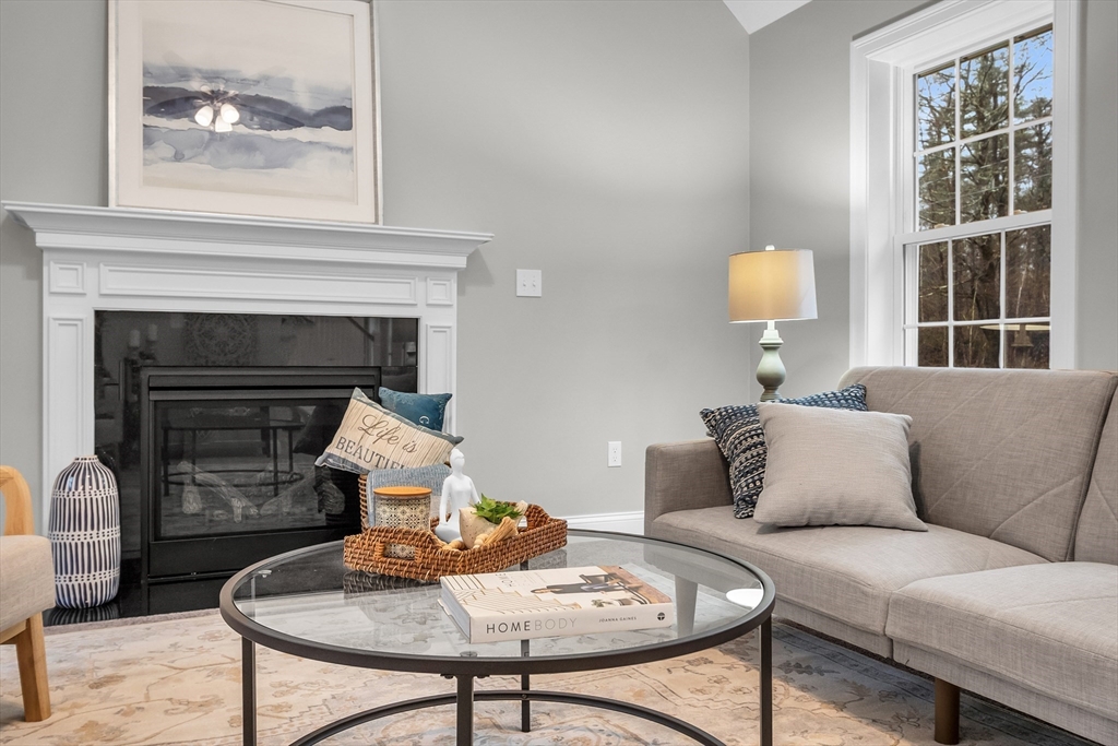 0 Gardner Road, Unit APPLEWOOD Templeton, MA 01468 - Photo 6 of 36 a living room with furniture and a fireplace