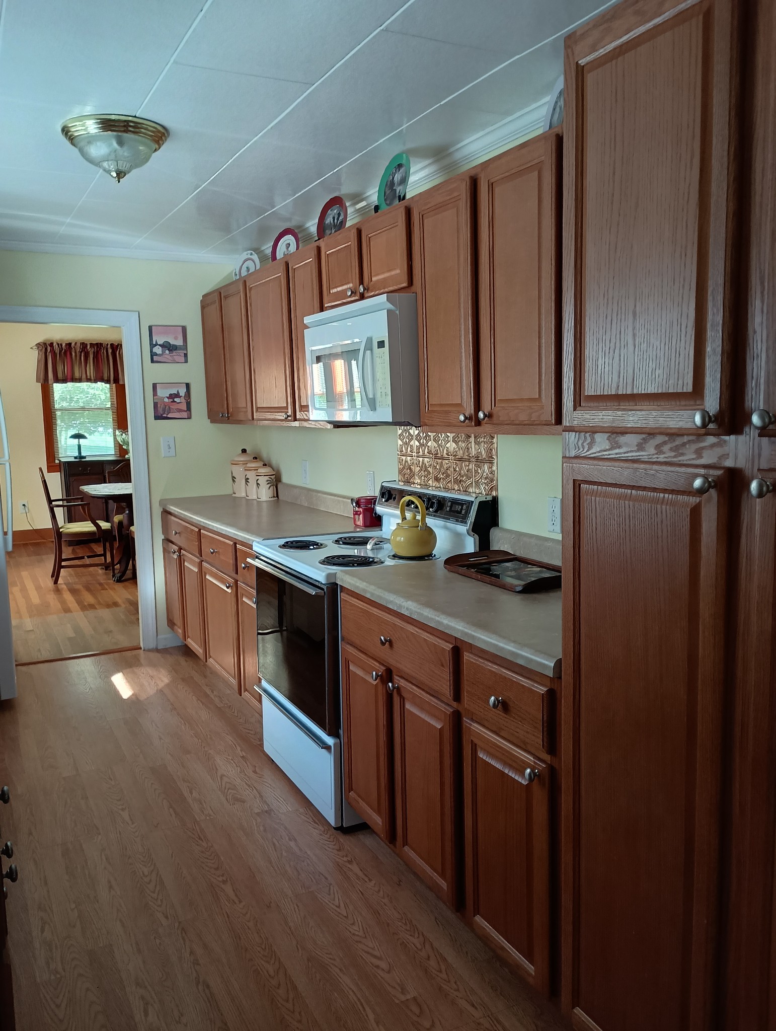 226 Lake O'Donnell Road Sewanee, TN 37375 - Photo 19 of 40 a kitchen with stainless steel appliances a sink stove and cabinets