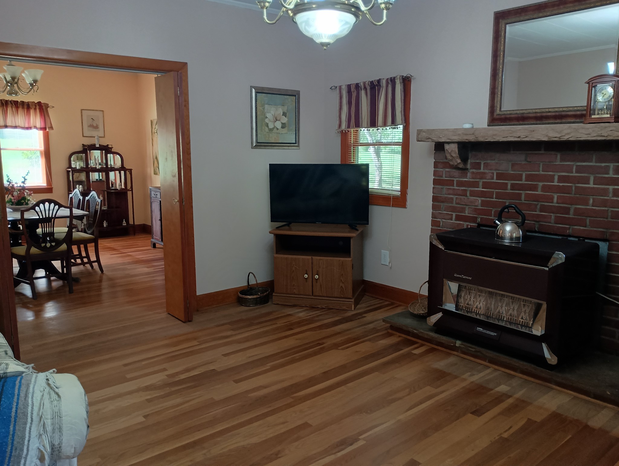 226 Lake O'Donnell Road Sewanee, TN 37375 - Photo 21 of 40 a living room with furniture a flat screen tv and a fireplace