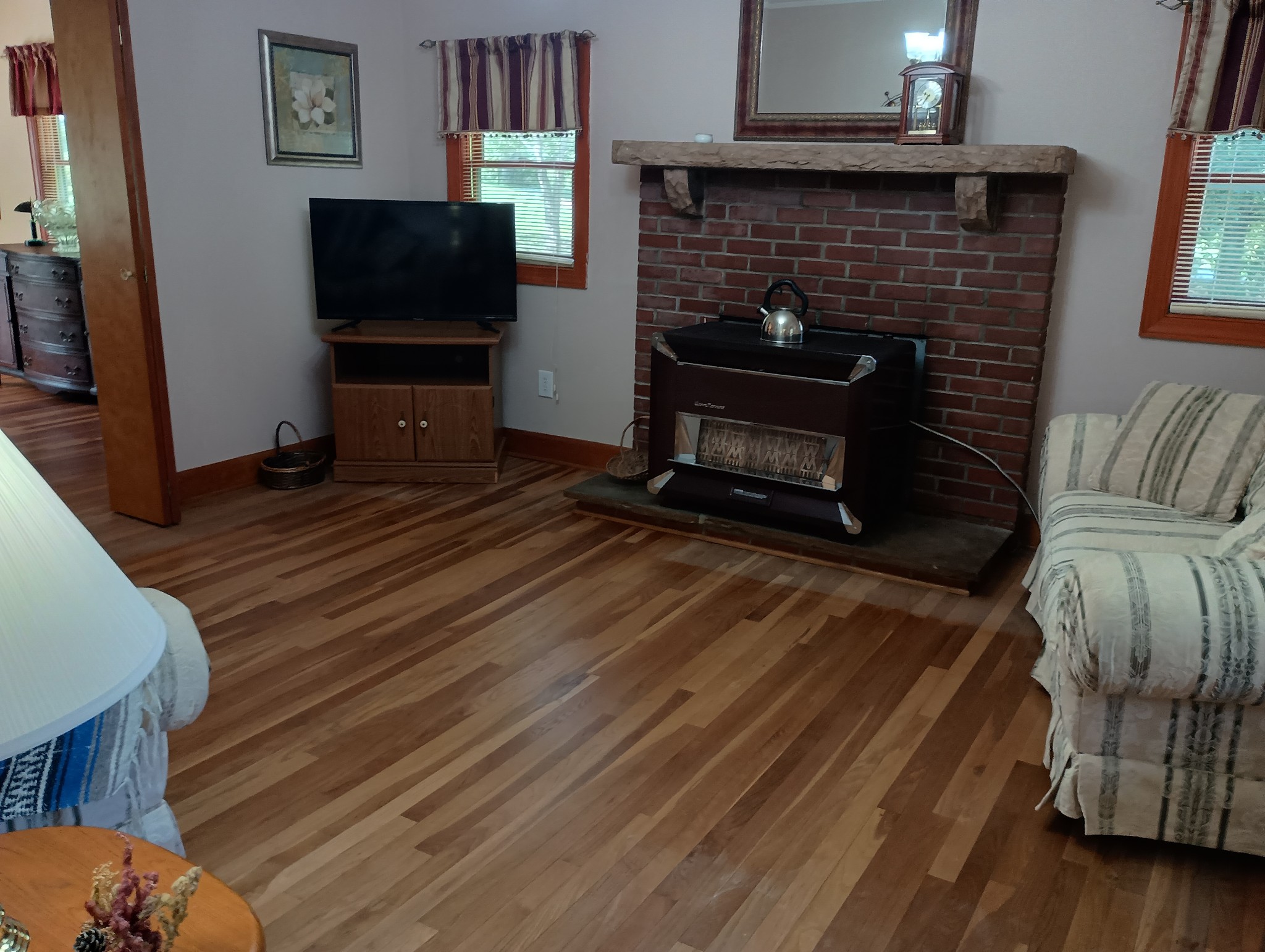 226 Lake O'Donnell Road Sewanee, TN 37375 - Photo 22 of 40 a living room with furniture and a fireplace