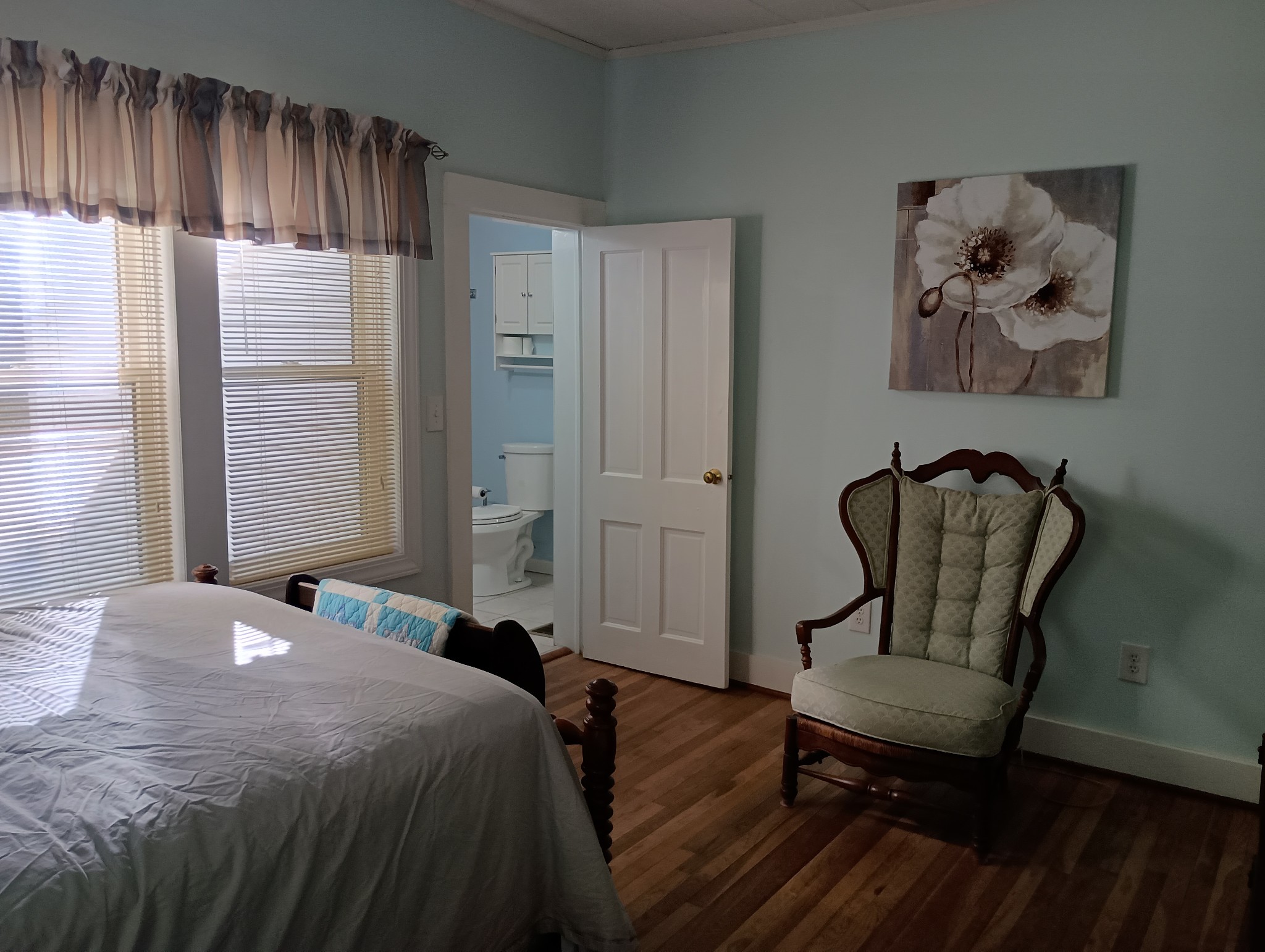 226 Lake O'Donnell Road Sewanee, TN 37375 - Photo 27 of 40 a bedroom with a bed chair and window