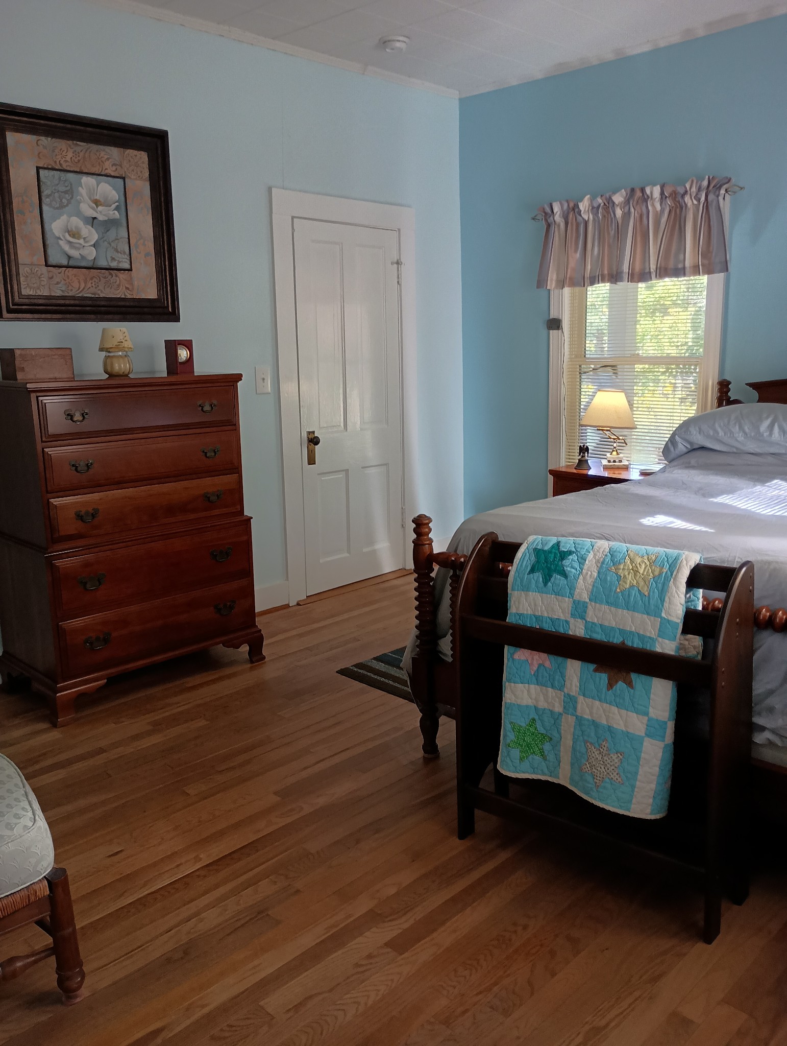 226 Lake O'Donnell Road Sewanee, TN 37375 - Photo 28 of 40 a bedroom with a bed and wooden floor