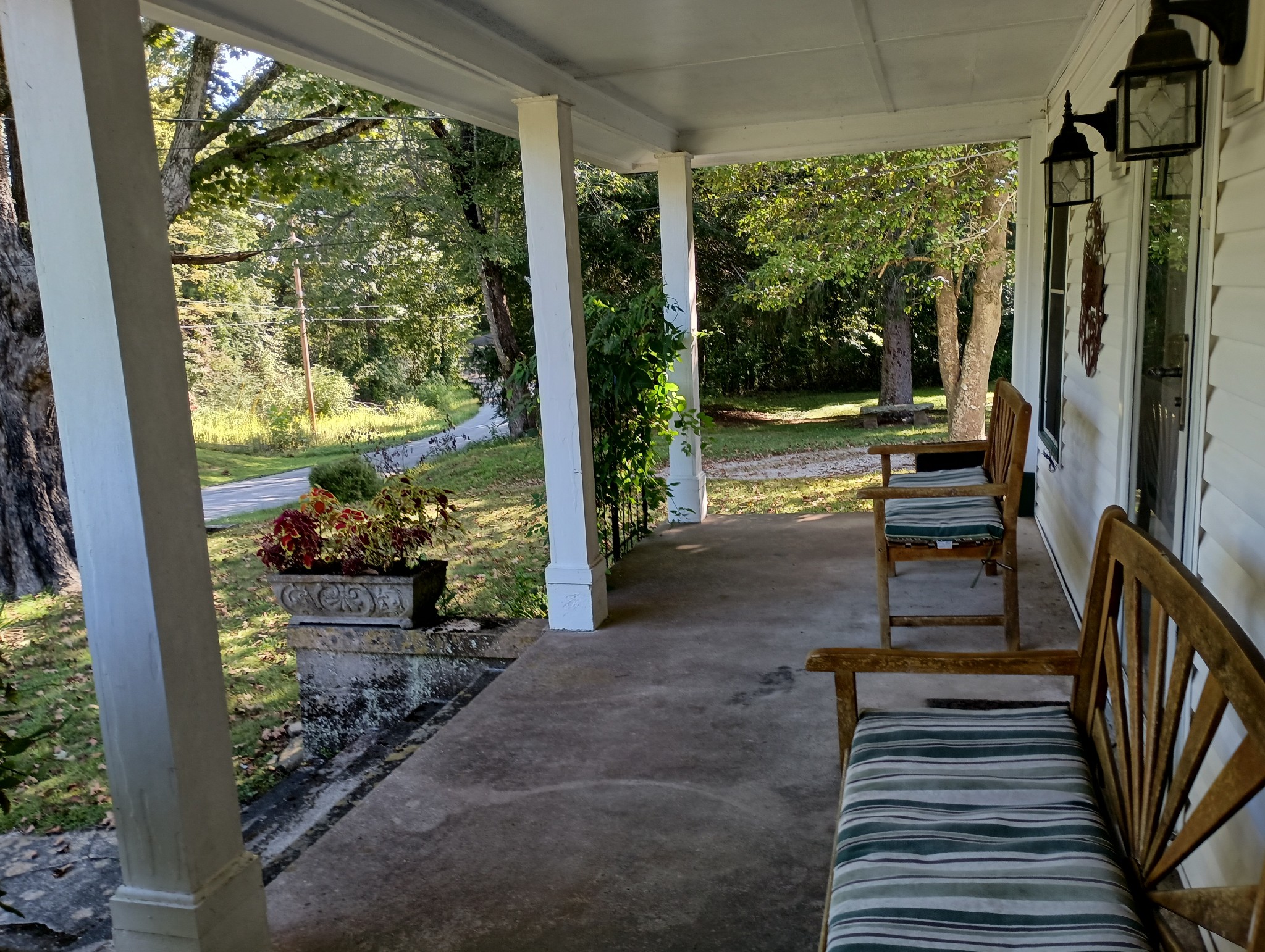 226 Lake O'Donnell Road Sewanee, TN 37375 - Photo 4 of 40 a view of a porch with wooden floor