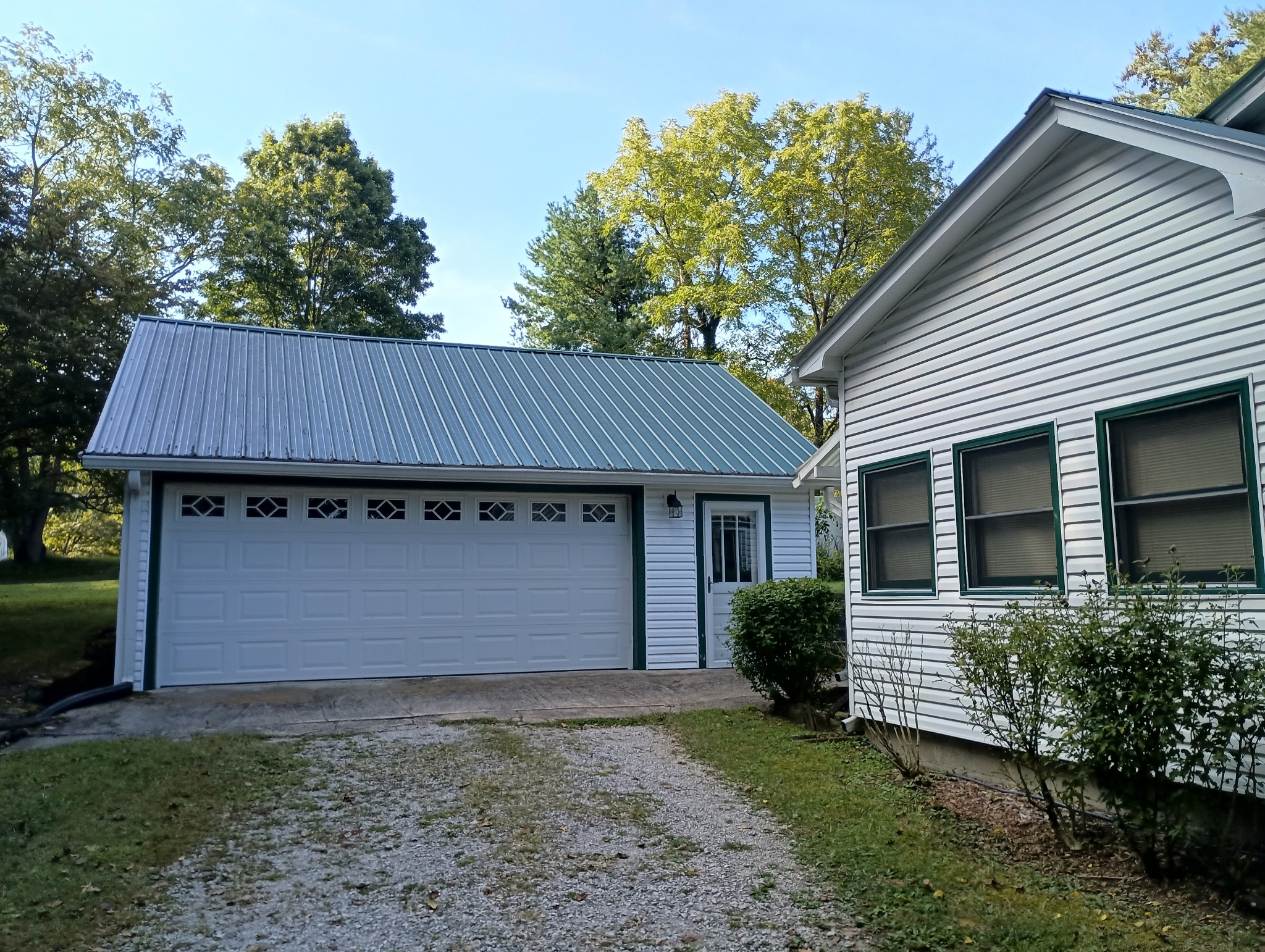 226 Lake O'Donnell Road Sewanee, TN 37375 - Photo 6 of 40 a front view of a house with garden