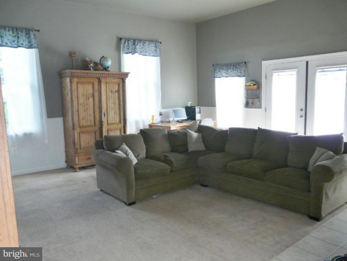 7224 Gilardi Road Boonsboro, MD 21713 - Photo 14 of 30 a living room with furniture and a window