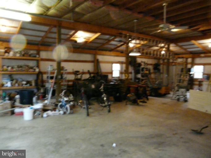 7224 Gilardi Road Boonsboro, MD 21713 - Photo 3 of 30 a room with gym equipment