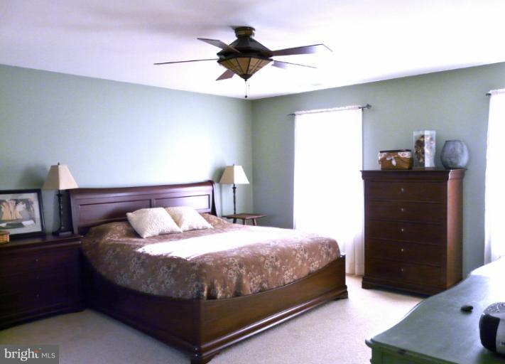 7224 Gilardi Road Boonsboro, MD 21713 - Photo 21 of 30 a bedroom with a bed and a desk