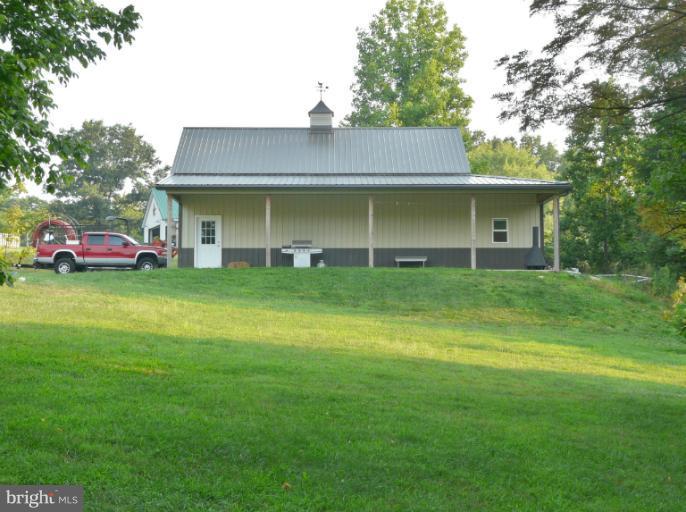 7224 Gilardi Road Boonsboro, MD 21713 - Photo 27 of 30 a view of a house with a garden