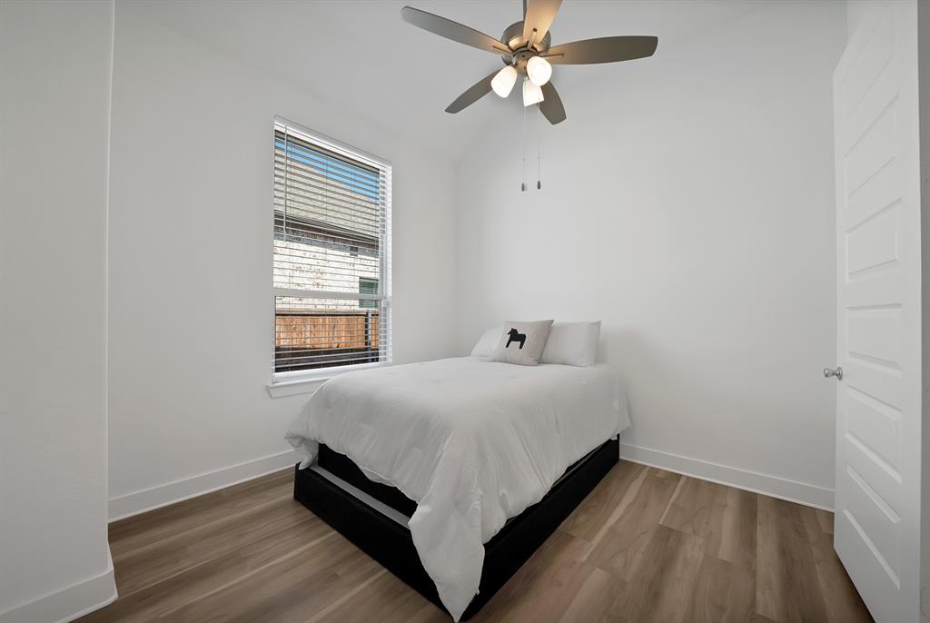 1709 Shetland Road Aubrey, TX 76227 - Photo 23 of 35 a bedroom with a bed and window