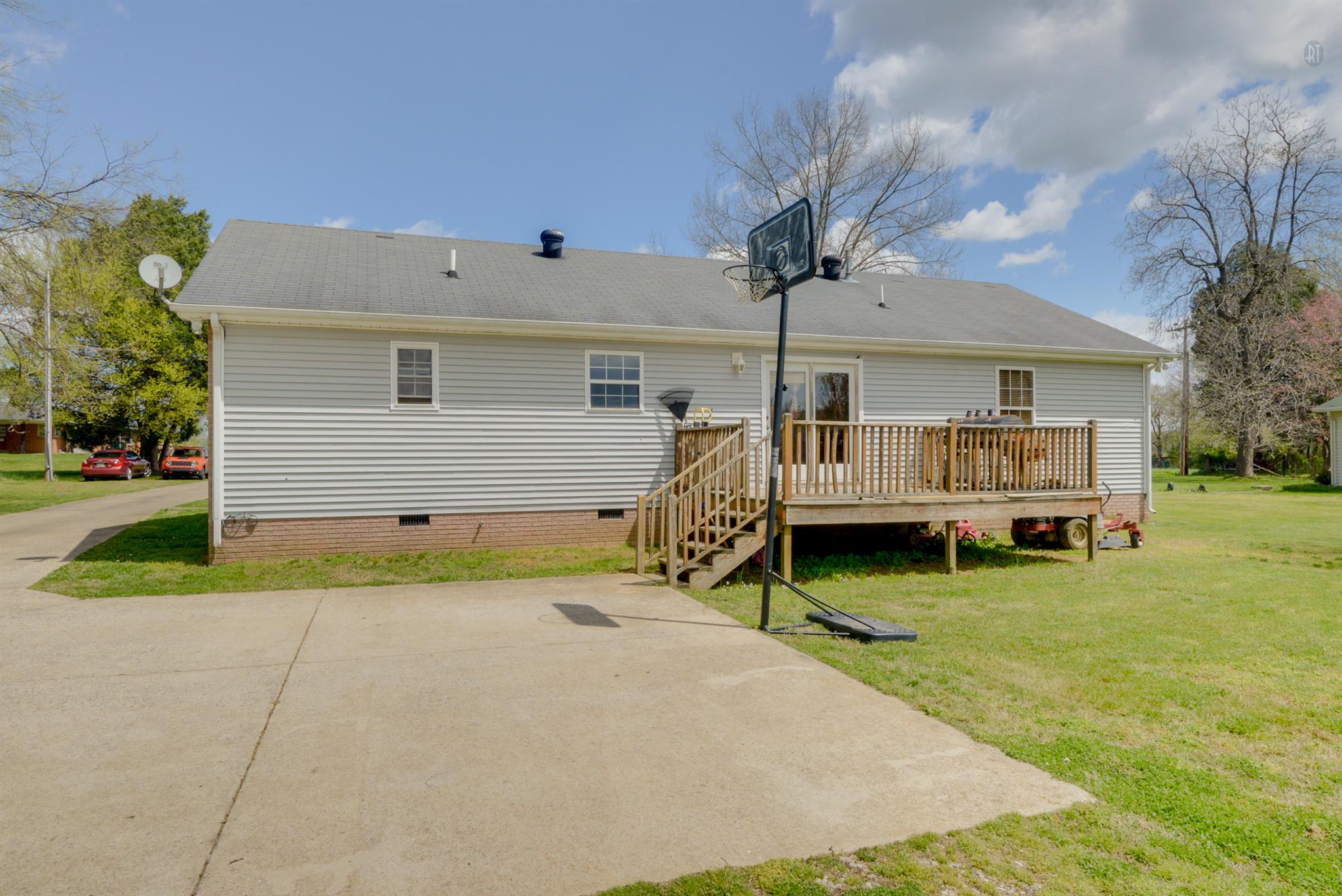 244 T G T Road Portland, TN 37148 - Photo 9 of 10 a view of backyard with a garden and entertaining space