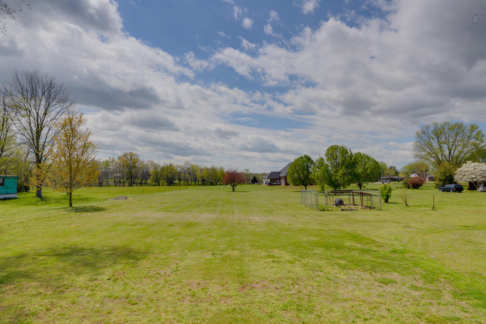 244 T G T Road Portland, TN 37148 - Photo 10 of 10 a view of an outdoor space and basketball court