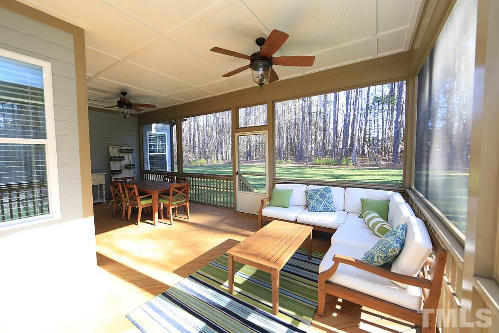 7600 Scarlet Court Raleigh, NC 27614 - Photo 19 of 30 Very rare you find a screened deck this large great for watching the kids play in the yard.
