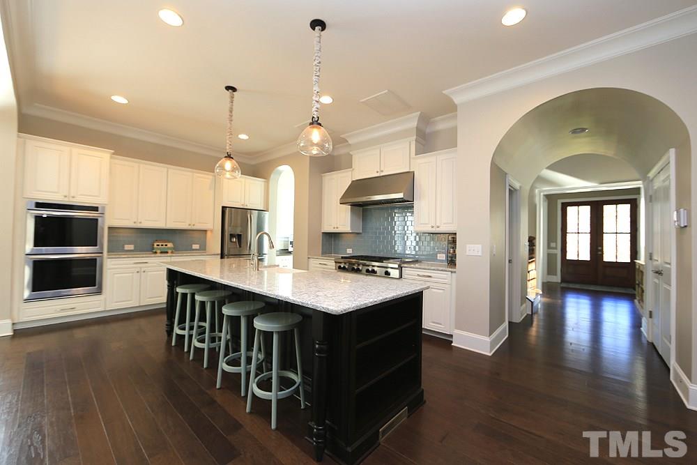 7600 Scarlet Court Raleigh, NC 27614 - Photo 8 of 30 Gas cooktop with double oven make this a great place to cook.