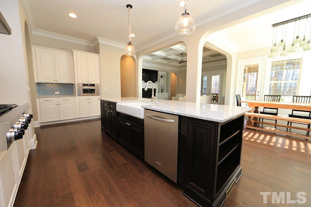 7600 Scarlet Court Raleigh, NC 27614 - Photo 9 of 30 Watch the kids while you cook in this amazing kitchen with huge walk-in pantry.