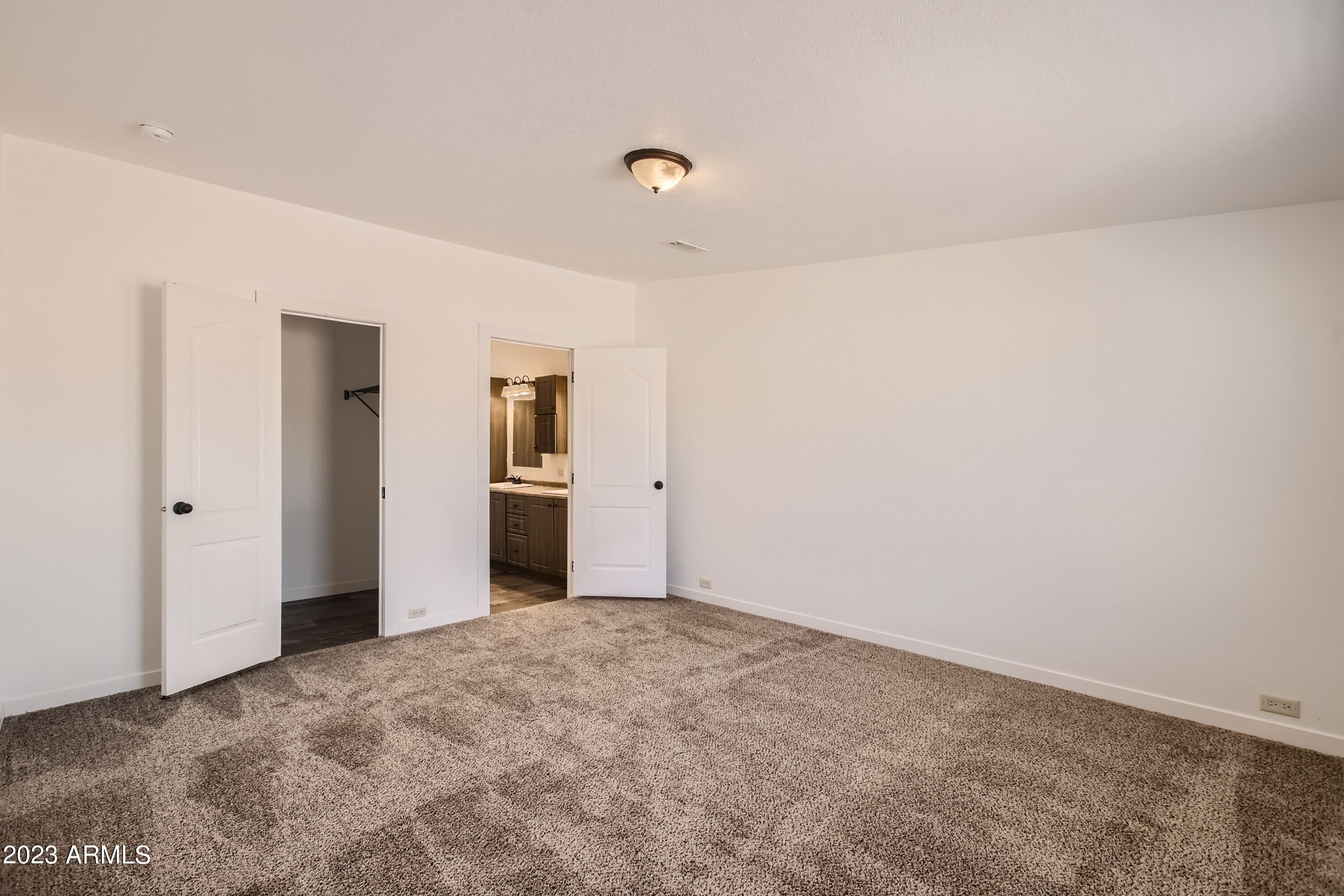 56877 West Papago Road Maricopa, AZ 85139 - Photo 16 of 27 15 Primary Bedroom