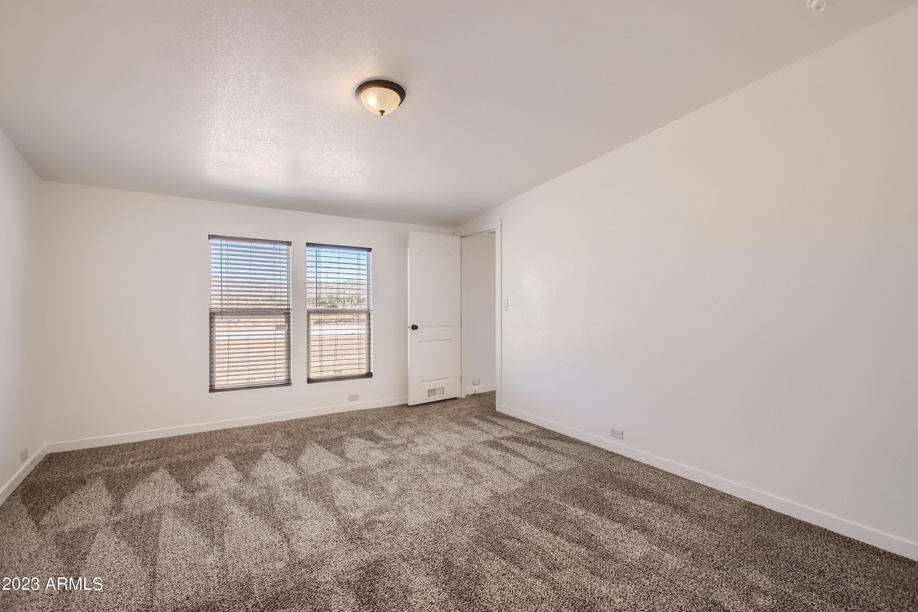 56877 West Papago Road Maricopa, AZ 85139 - Photo 17 of 27 16 Primary Bedroom