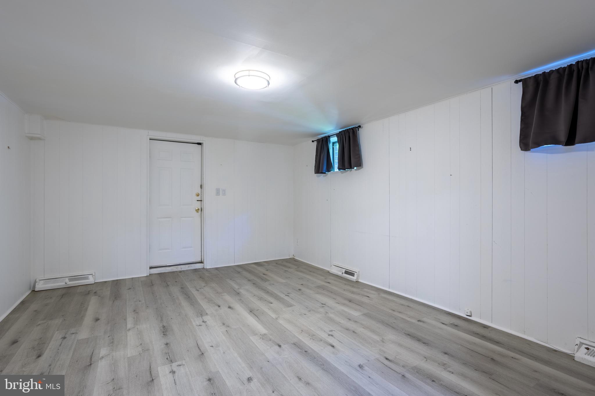3207 Midfield Road Pikesville, MD 21208 - Photo 34 of 45 a view of room with hardwood floor