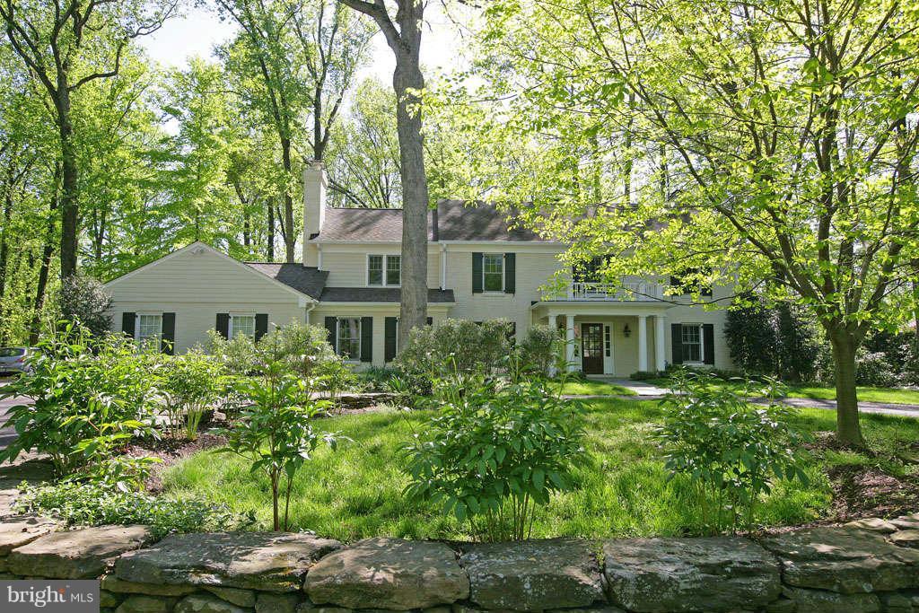 10820 Lockland Road Potomac, MD 20854 - Photo 1 of 30 a front view of a house with a garden