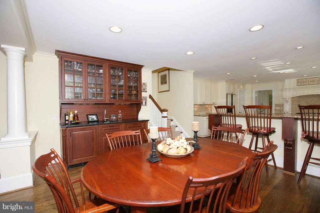 10820 Lockland Road Potomac, MD 20854 - Photo 18 of 30 a view of a dining room with furniture window and wooden floor