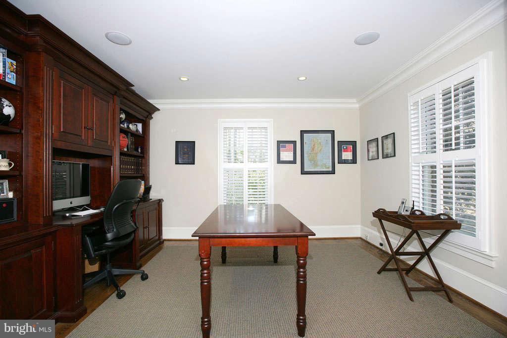 10820 Lockland Road Potomac, MD 20854 - Photo 20 of 30 a living room with furniture a flat screen tv and a window