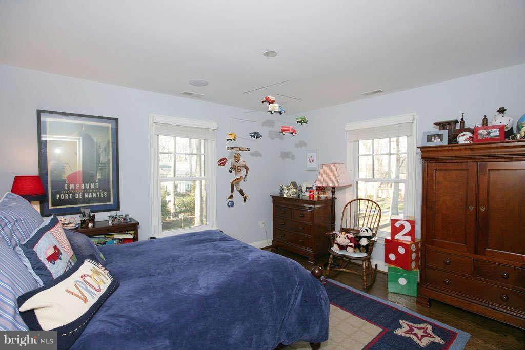 10820 Lockland Road Potomac, MD 20854 - Photo 26 of 30 a bedroom with furniture and a window