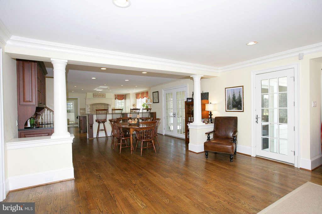 10820 Lockland Road Potomac, MD 20854 - Photo 10 of 30 a livingroom with furniture wooden floor and windows