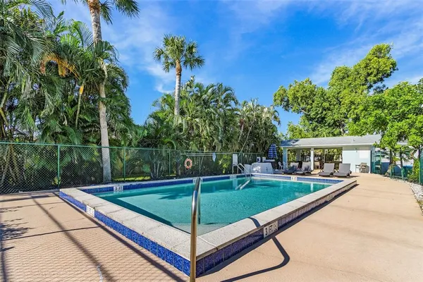 a view of a backyard with a patio