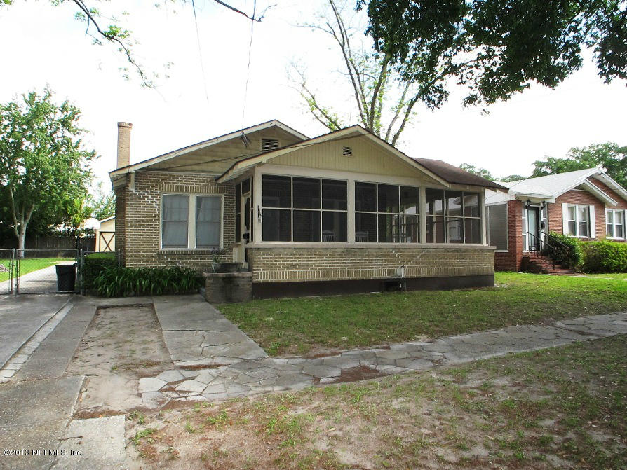 5109 Birkenhead Road Jacksonville, FL 32210 - Photo 1 of 20 a view of a house with a yard