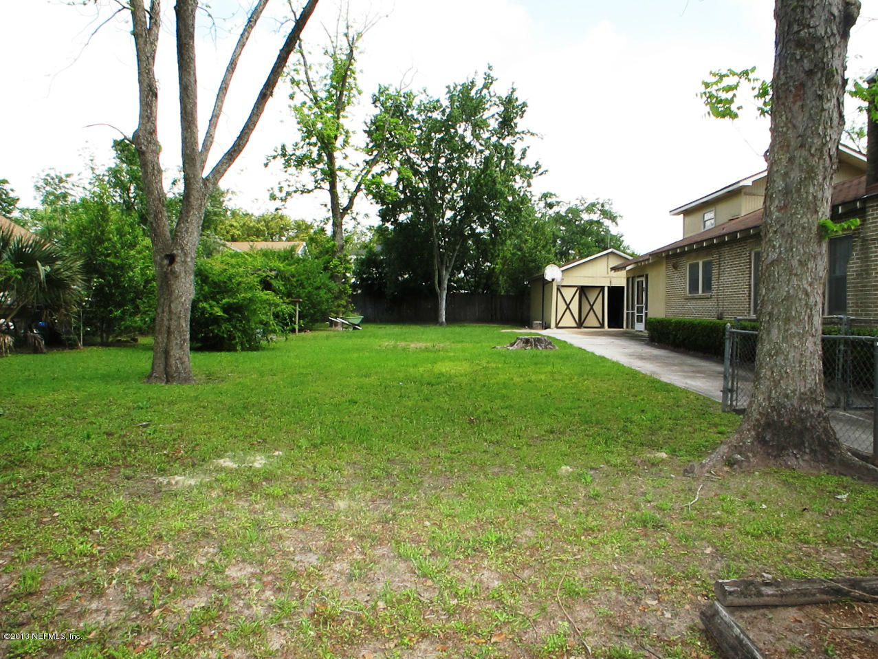5109 Birkenhead Road Jacksonville, FL 32210 - Photo 17 of 20 a view of a house with a big yard