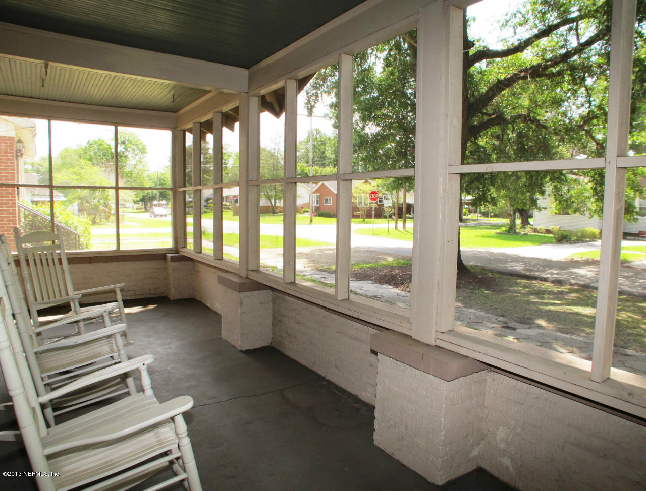 5109 Birkenhead Road Jacksonville, FL 32210 - Photo 3 of 20 a room with large windows and furniture