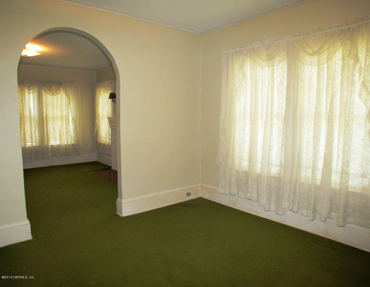 5109 Birkenhead Road Jacksonville, FL 32210 - Photo 5 of 20 a view of an empty room and window