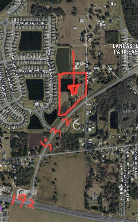 1888 Druliner Road St. Cloud, FL 34771 - Photo 4 of 12 a picture of street