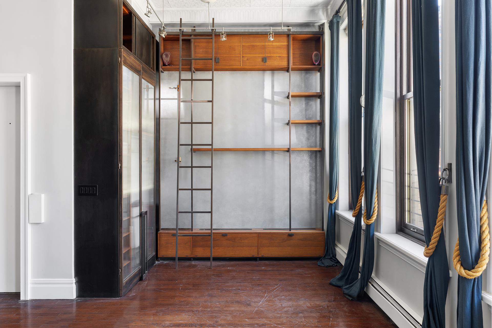 46 Mercer Street, Unit 4W Manhattan, NY 10013 - Photo 11 of 19 a view of front door with hallway and stairs