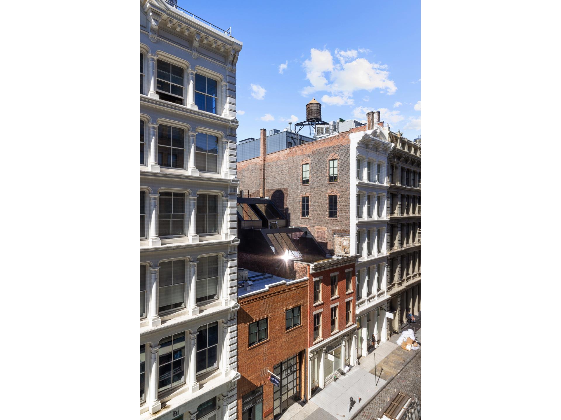 46 Mercer Street, Unit 4W Manhattan, NY 10013 - Photo 17 of 19 a view of a building with a large window