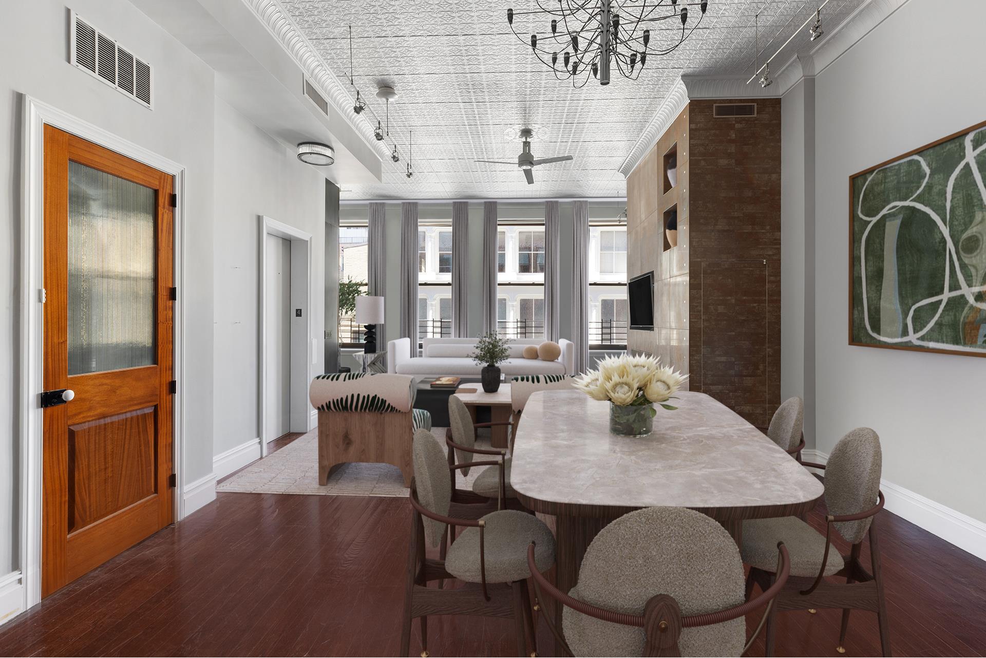 46 Mercer Street, Unit 4W Manhattan, NY 10013 - Photo 3 of 19 a view of a dining room with furniture window and wooden floor