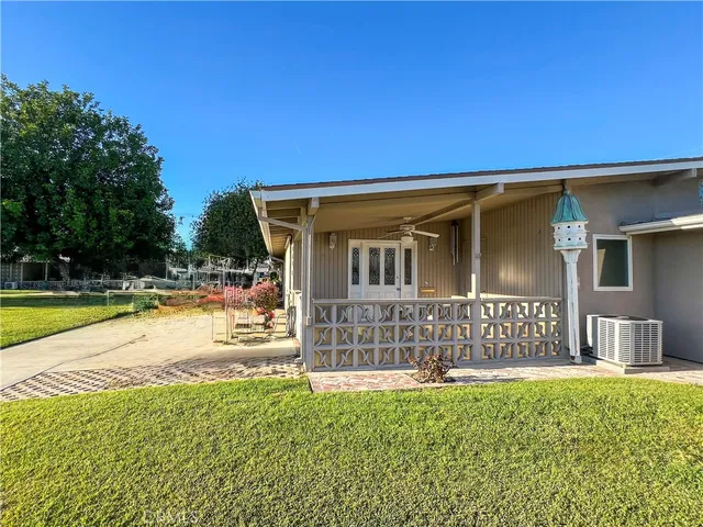 a view of a house with a swimming pool
