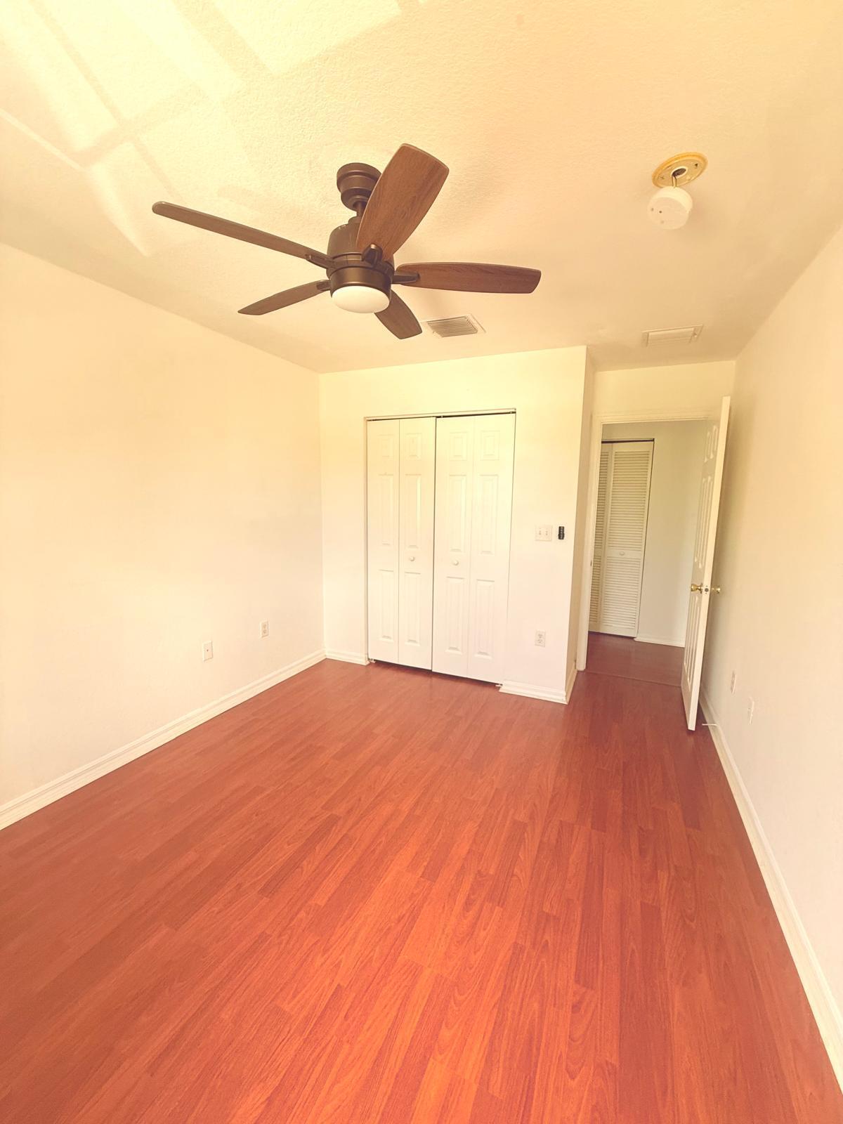 4534 Southwest 127th Terrace Miramar, FL 33027 - Photo 20 of 45 a view of empty room with wooden floor