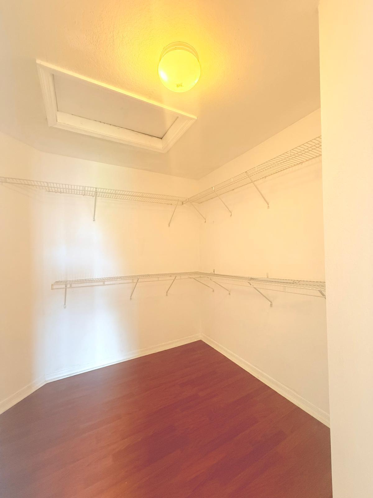 4534 Southwest 127th Terrace Miramar, FL 33027 - Photo 24 of 45 a view of a room with racks on the wall