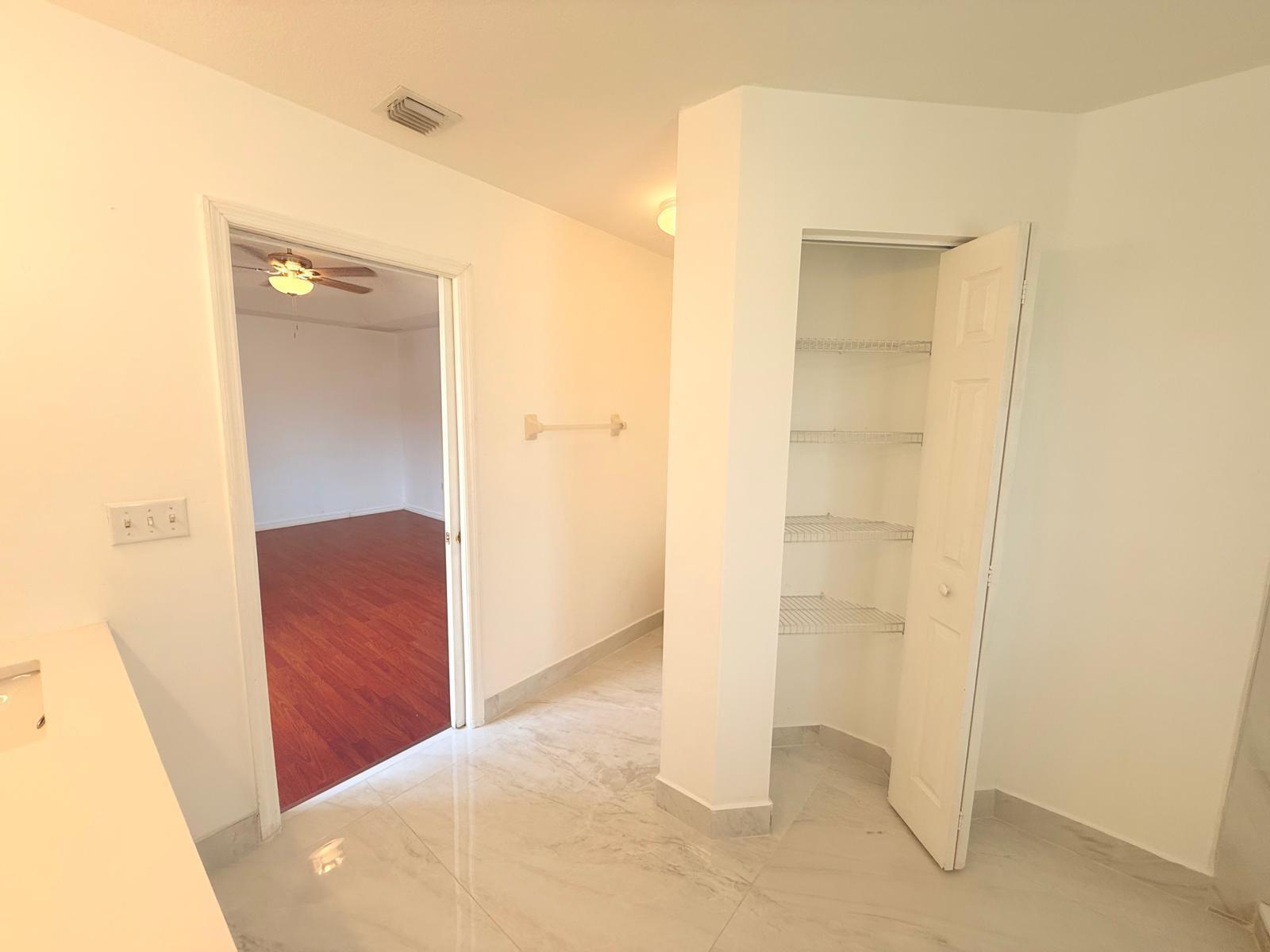 4534 Southwest 127th Terrace Miramar, FL 33027 - Photo 27 of 45 a view of a hallway with closet