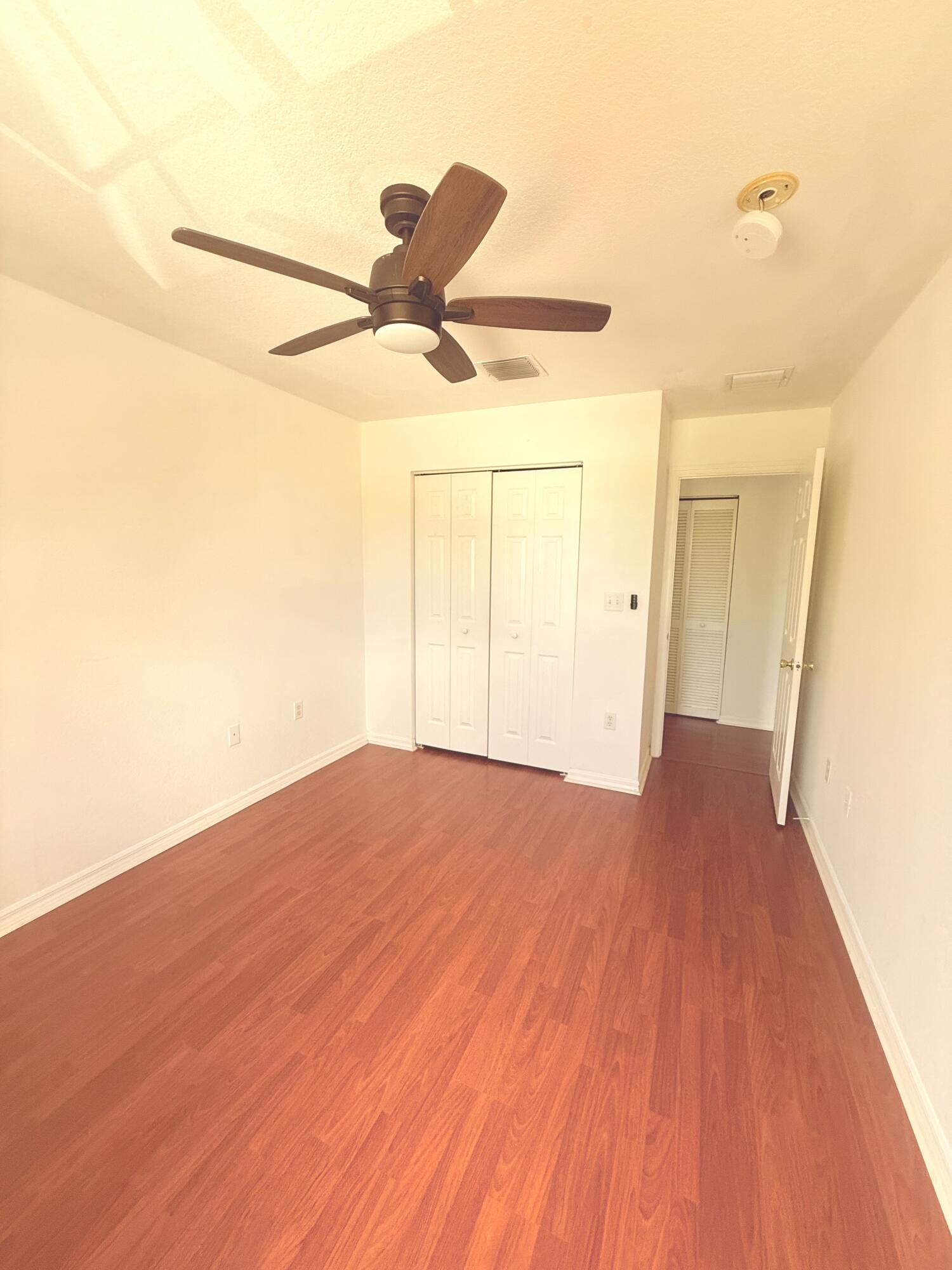 4534 Southwest 127th Terrace Miramar, FL 33027 - Photo 33 of 45 a view of empty room with wooden floor