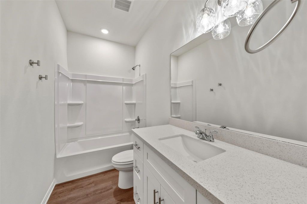 706 West Dallas Street Conroe, TX 77301 - Photo 37 of 38 Image showcases finishes and condition. Floor plan may vary.