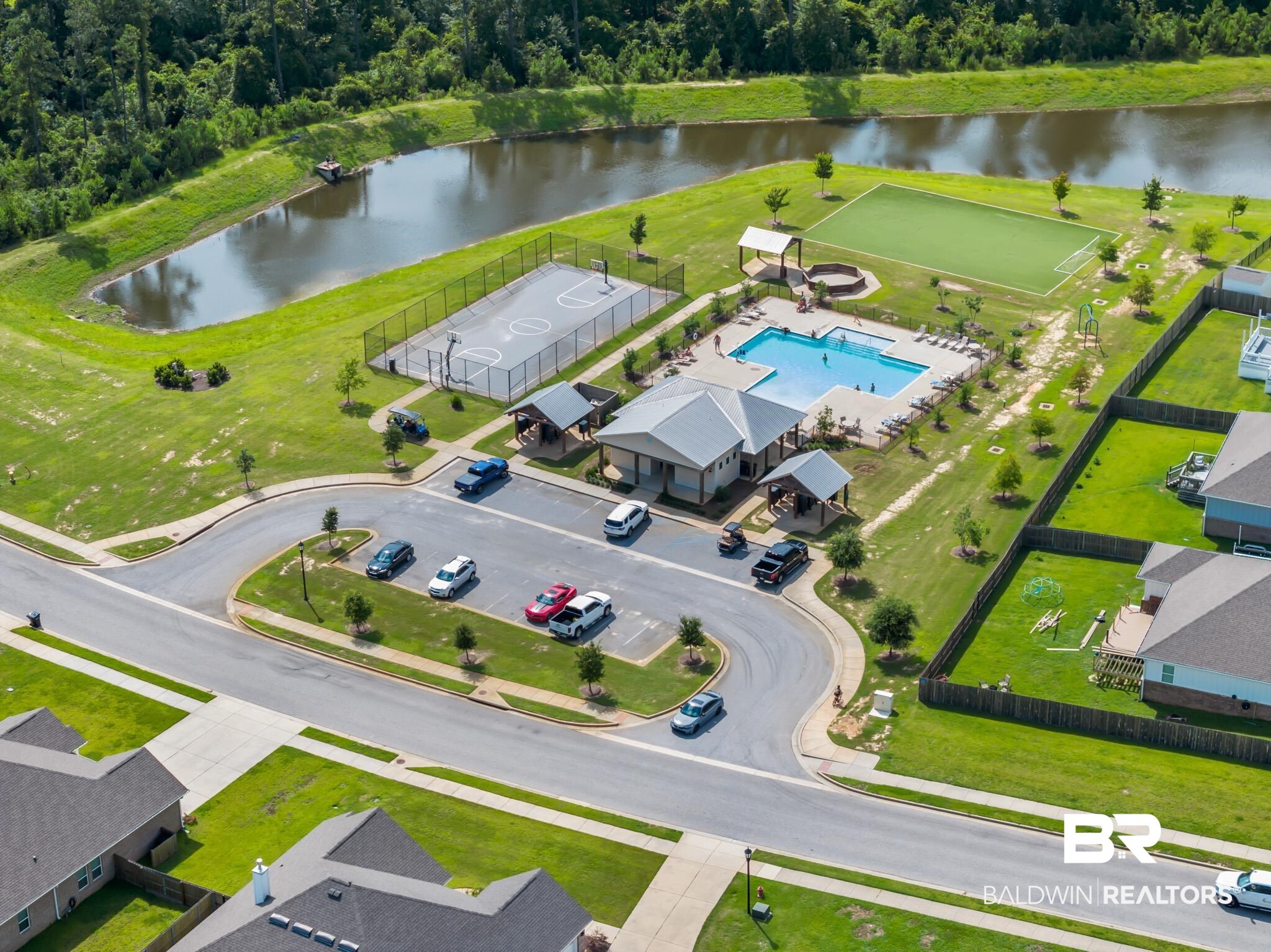 32125 Lyon Road Daphne, AL 36527 - Photo 47 of 70 Community recreation area featuring a swimming pool, covered pavilion, basketball court, and artificial turf field