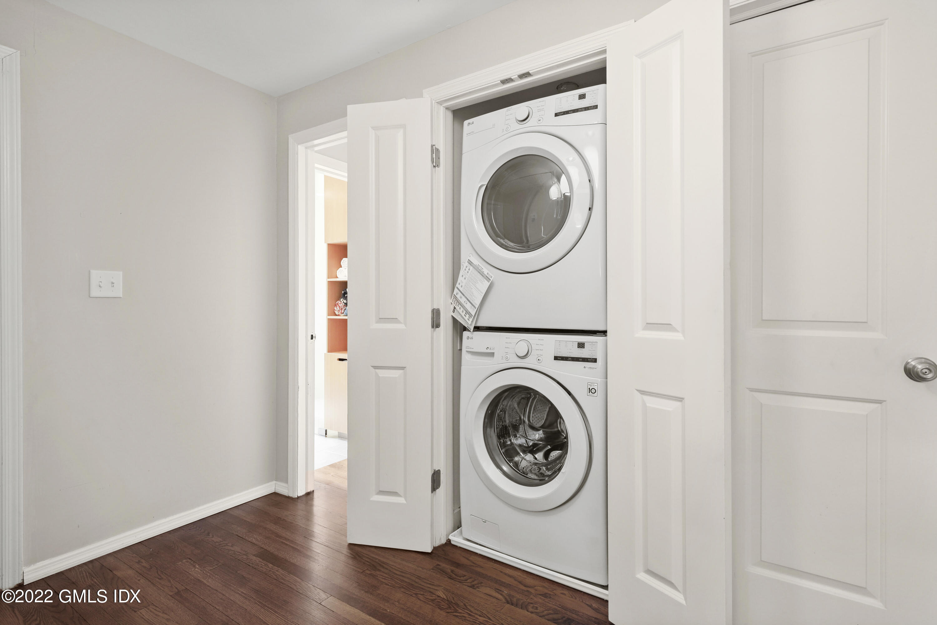 17 Tory Road Riverside, CT 06878 - Photo 12 of 19 a view of a hallway with washer and dryer