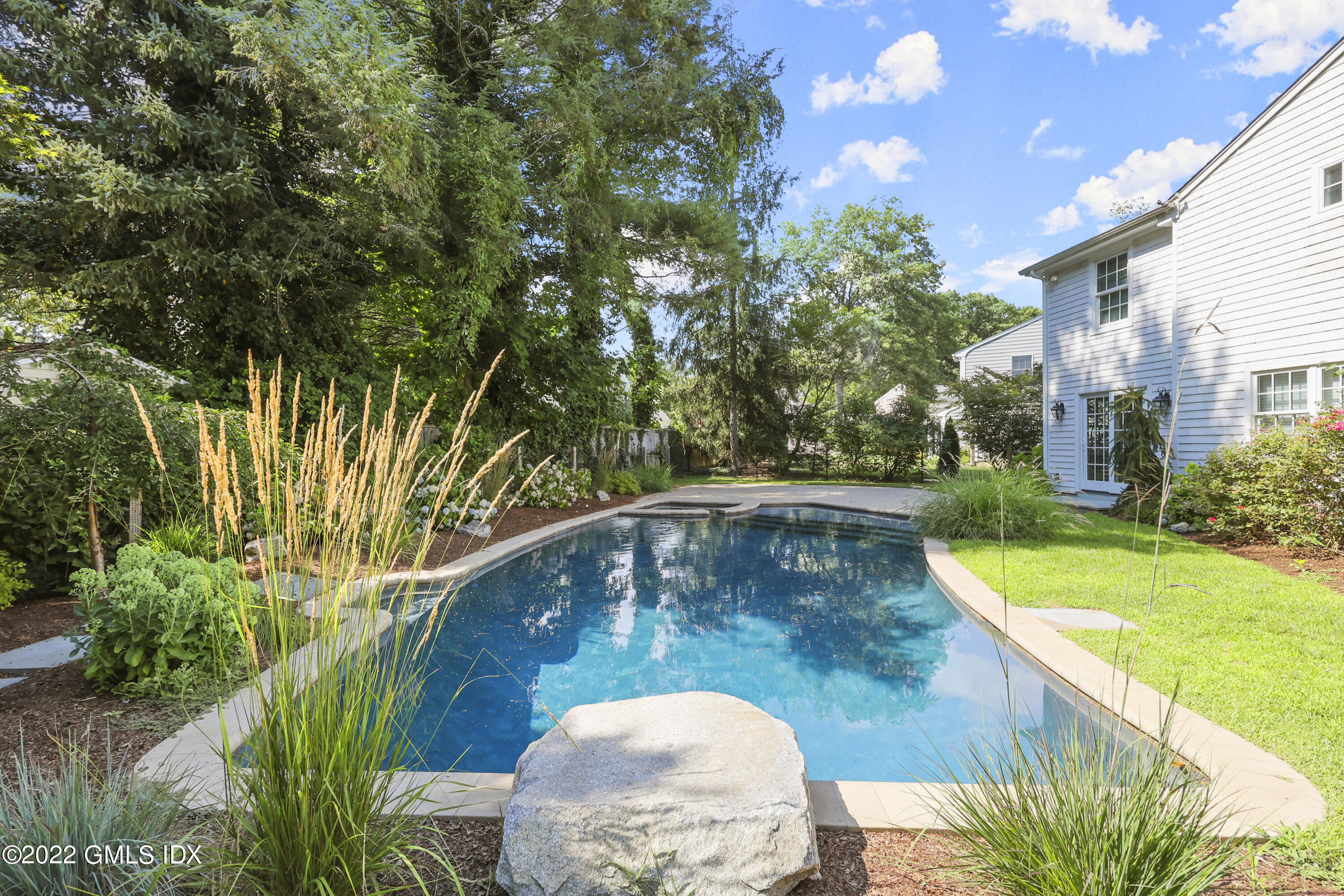 17 Tory Road Riverside, CT 06878 - Photo 15 of 19 a view of a swimming pool with a patio and garden