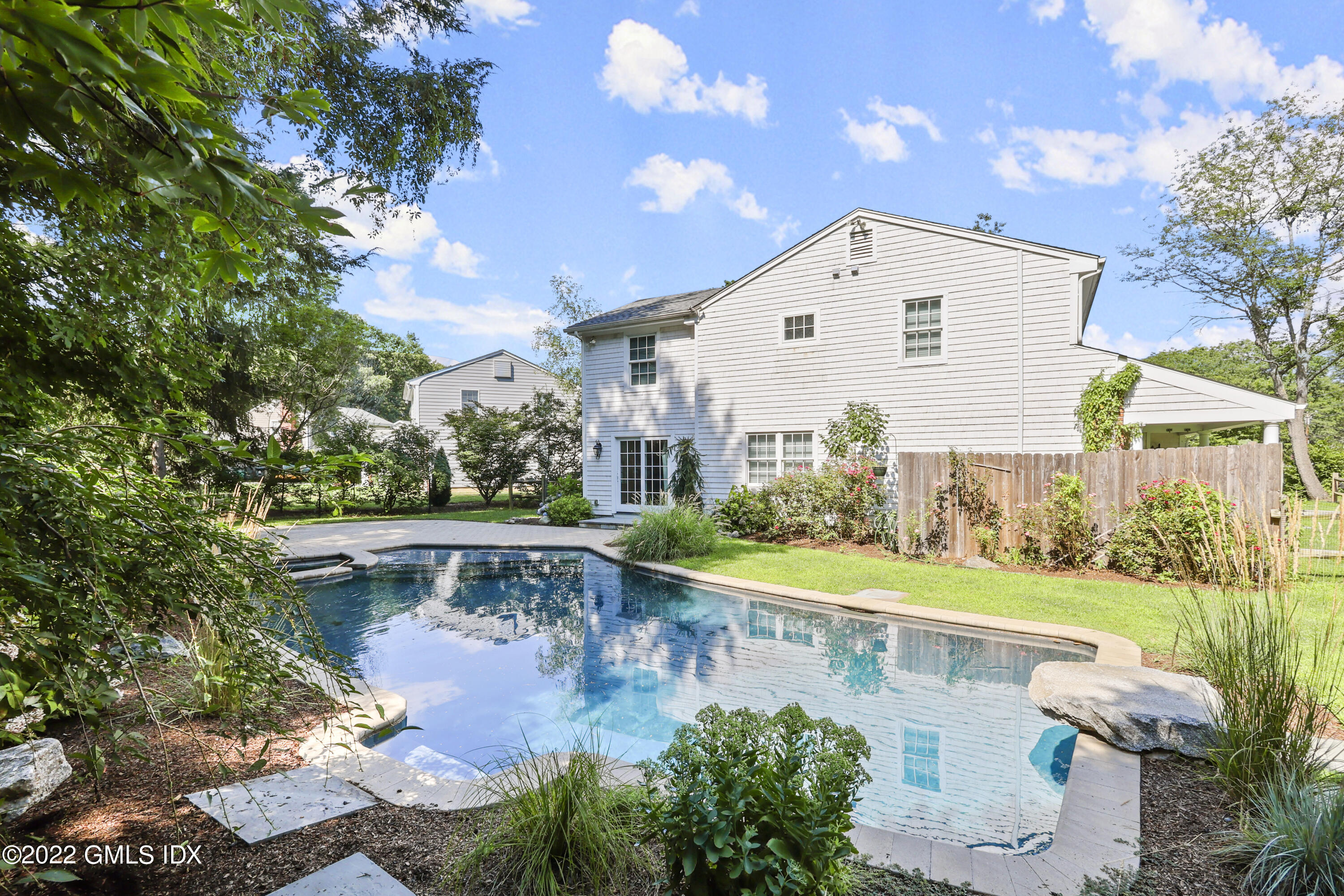 17 Tory Road Riverside, CT 06878 - Photo 16 of 19 a view of a backyard with a tub and trees