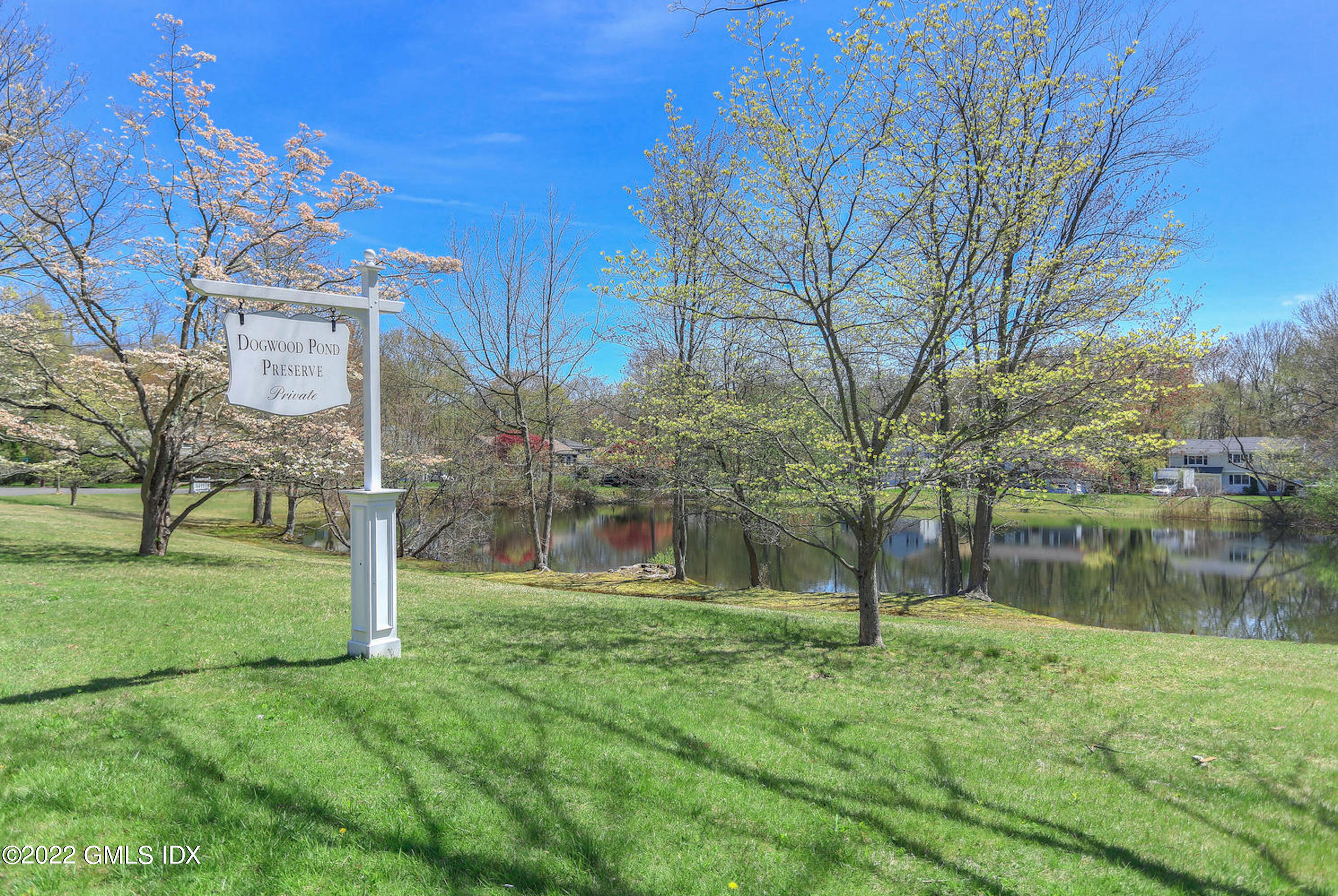 17 Tory Road Riverside, CT 06878 - Photo 17 of 19 a backyard of a house with lots of green space