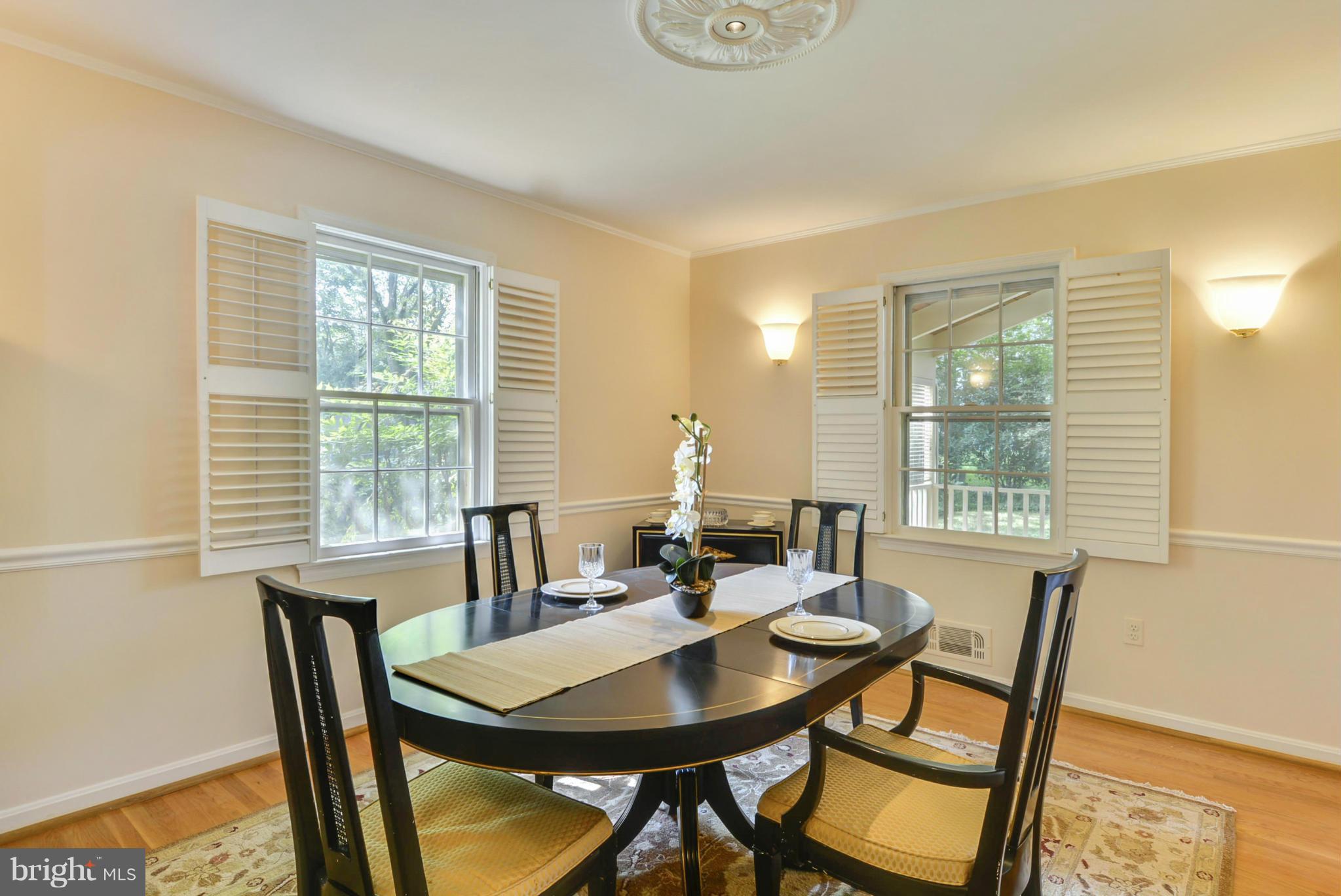 1705 Old Stage Road Alexandria, VA 22308 - Photo 3 of 23 a view of a dining room with furniture and window