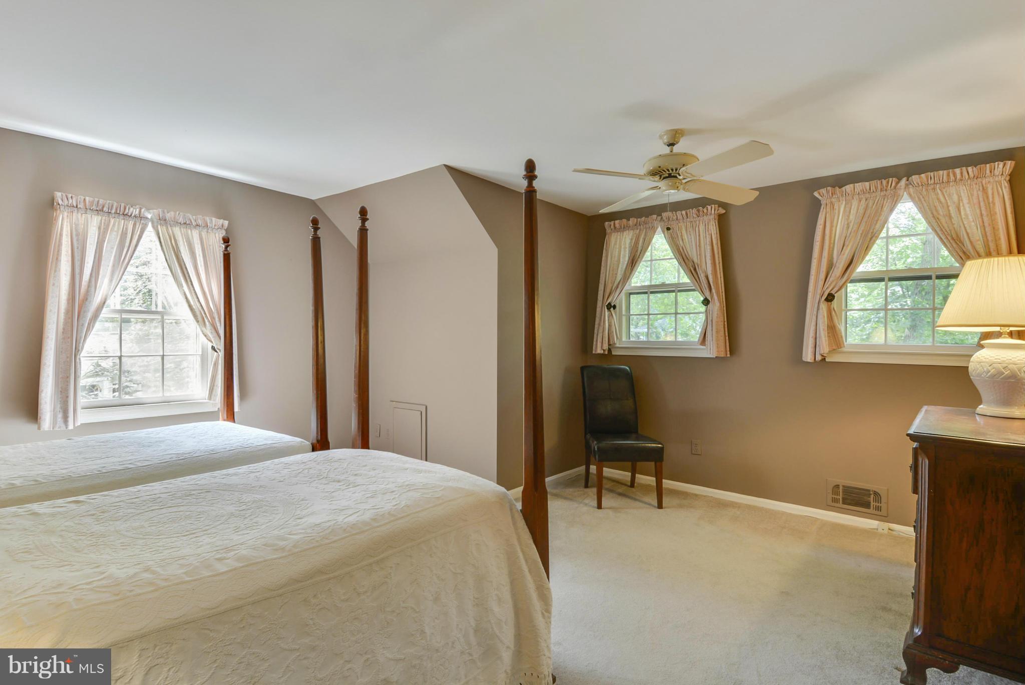 1705 Old Stage Road Alexandria, VA 22308 - Photo 9 of 23 a bedroom with a bed and windows